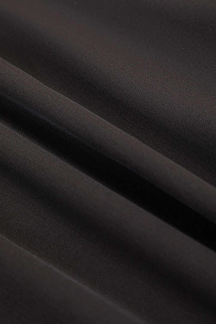 Falty | Faltenreiche asymmetrische weit geschnittene Hose